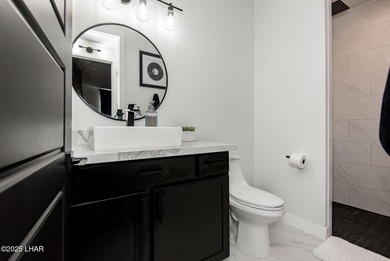 Presenting 6393 S Via De Oro, Fort Mohave, Arizona, a custom on Los Lagos Golf Club in Arizona - for sale on GolfHomes.com, golf home, golf lot