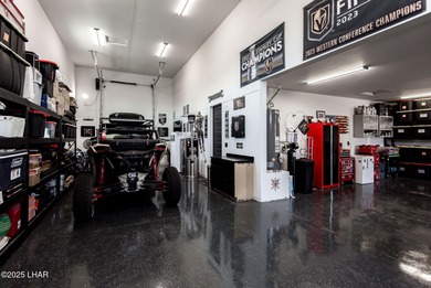 Presenting 6393 S Via De Oro, Fort Mohave, Arizona, a custom on Los Lagos Golf Club in Arizona - for sale on GolfHomes.com, golf home, golf lot