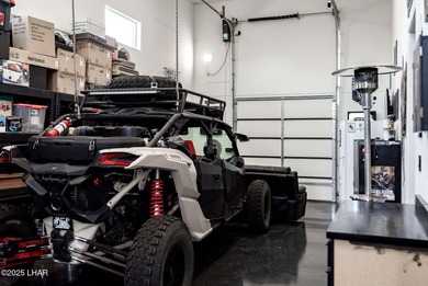 Presenting 6393 S Via De Oro, Fort Mohave, Arizona, a custom on Los Lagos Golf Club in Arizona - for sale on GolfHomes.com, golf home, golf lot