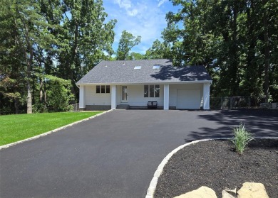 This beautiful 3 bedroom home sits right across from a scenic on St Georges Golf and Country Club in New York - for sale on GolfHomes.com, golf home, golf lot
