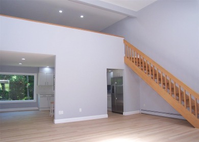 This beautiful 3 bedroom home sits right across from a scenic on St Georges Golf and Country Club in New York - for sale on GolfHomes.com, golf home, golf lot