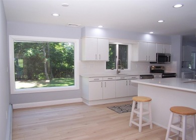 This beautiful 3 bedroom home sits right across from a scenic on St Georges Golf and Country Club in New York - for sale on GolfHomes.com, golf home, golf lot