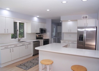 This beautiful 3 bedroom home sits right across from a scenic on St Georges Golf and Country Club in New York - for sale on GolfHomes.com, golf home, golf lot