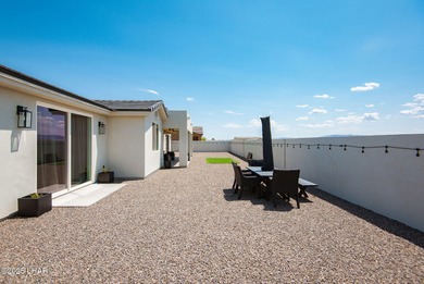 Presenting 6393 S Via De Oro, Fort Mohave, Arizona, a custom on Los Lagos Golf Club in Arizona - for sale on GolfHomes.com, golf home, golf lot