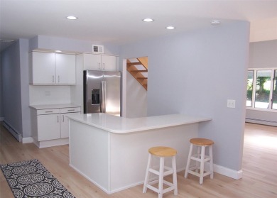 This beautiful 3 bedroom home sits right across from a scenic on St Georges Golf and Country Club in New York - for sale on GolfHomes.com, golf home, golf lot
