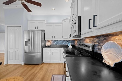 Experience true coastal living in this exceptional waterfront on Sea Pines Golf Club in Florida - for sale on GolfHomes.com, golf home, golf lot