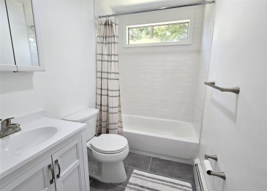 This beautiful 3 bedroom home sits right across from a scenic on St Georges Golf and Country Club in New York - for sale on GolfHomes.com, golf home, golf lot