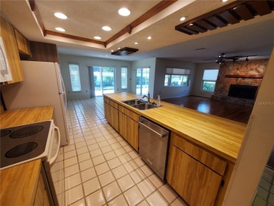A wonderful well-maintained home located in the desirable on East Lake Woodlands Country Club in Florida - for sale on GolfHomes.com, golf home, golf lot