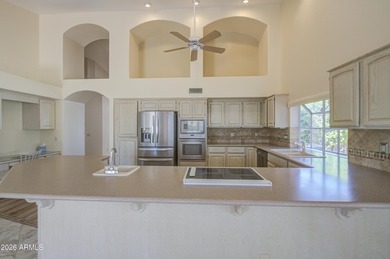 After a challenging day of golf, escape to the serenity of your on Palo Verde Golf and Country Club in Arizona - for sale on GolfHomes.com, golf home, golf lot