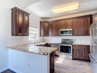Welcome to your new home in the award-winning adult (55 and on Stonegate Golf Club in Florida - for sale on GolfHomes.com, golf home, golf lot