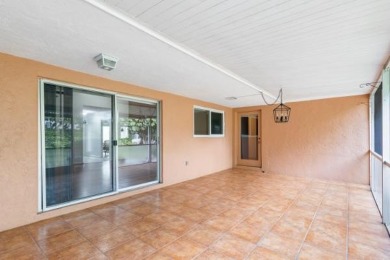 NEW LOWER PRICE. NEW PHOTOS. 2 bedroom/2 bath Villa with huge on Poinciana Golf Club in Florida - for sale on GolfHomes.com, golf home, golf lot