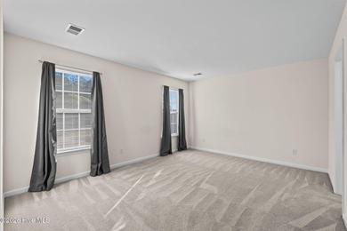 A 3 Bedroom 2 Bathroom Rancher with a 2-car Garage minutes from on Sandpiper Bay Golf and Country Club in North Carolina - for sale on GolfHomes.com, golf home, golf lot