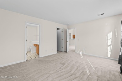 A 3 Bedroom 2 Bathroom Rancher with a 2-car Garage minutes from on Sandpiper Bay Golf and Country Club in North Carolina - for sale on GolfHomes.com, golf home, golf lot