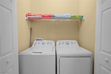 Panoramic lake & golf course VIEW is included with this SOCIAL on Legends Golf and Country Club in Florida - for sale on GolfHomes.com, golf home, golf lot