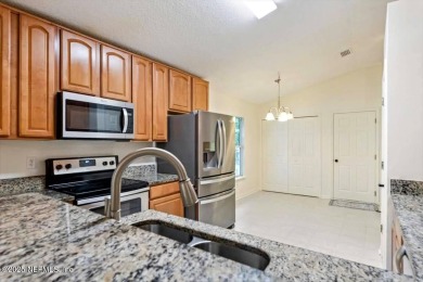 BEAUTIFUL & WELCOMING 4 Bedroom, 2 Bath, 2 Car Garage home built on King and Bear Golf Course/World Golf Village in Florida - for sale on GolfHomes.com, golf home, golf lot