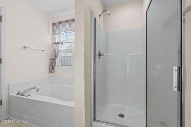 A 3 Bedroom 2 Bathroom Rancher with a 2-car Garage minutes from on Sandpiper Bay Golf and Country Club in North Carolina - for sale on GolfHomes.com, golf home, golf lot