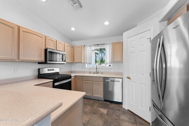 Welcome to this well-maintained 3 bedroom, 2 bathroom home on Desert Lakes Golf Course in Arizona - for sale on GolfHomes.com, golf home, golf lot