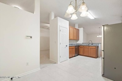 BEAUTIFUL & WELCOMING 4 Bedroom, 2 Bath, 2 Car Garage home built on King and Bear Golf Course/World Golf Village in Florida - for sale on GolfHomes.com, golf home, golf lot