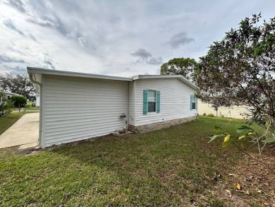 This clean and cozy 2-bedroom, 2-bathroom home offers a on Crystal Lake Club in Florida - for sale on GolfHomes.com, golf home, golf lot