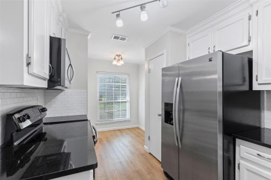 RARE OPPORTUNITY--GROUND FLOOR UNIT WITH GOLF COURSE AND CREEK on Prestonwood Country Club - Dallas County in Texas - for sale on GolfHomes.com, golf home, golf lot