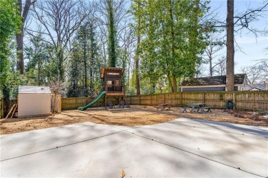 Welcome to 2715 Memorial Drive in East Lake. The home was built on East Lake Golf Club in Georgia - for sale on GolfHomes.com, golf home, golf lot