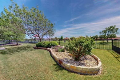 Beautiful single-story Marbella overlooking Hole 8 of the South on Wildhorse Golf Club of Robson Ranch in Texas - for sale on GolfHomes.com, golf home, golf lot