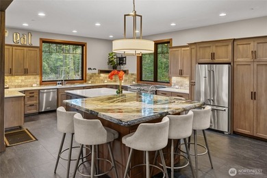 Perfectly positioned on the third green of Rope Rider, at the on Suncadia Resort in Washington - for sale on GolfHomes.com, golf home, golf lot