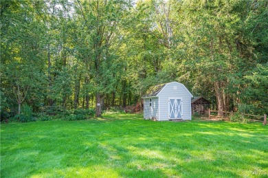 This beautiful 3-bedroom, 2-bath ranch is tucked away in the on Teugega Country Club in New York - for sale on GolfHomes.com, golf home, golf lot