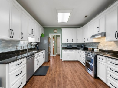 Discover the warmth and serenity of this meticulously maintained on River Falls Plantation in South Carolina - for sale on GolfHomes.com, golf home, golf lot