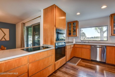 Move in ready! Super Cozy Frank Lloyd Wright type, red brick on Antelope Hills Golf Courses in Arizona - for sale on GolfHomes.com, golf home, golf lot