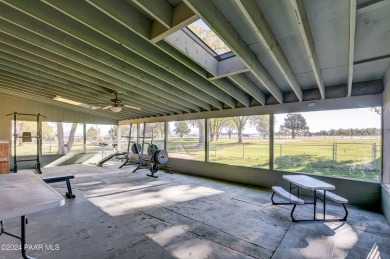 Move in ready! Super Cozy Frank Lloyd Wright type, red brick on Antelope Hills Golf Courses in Arizona - for sale on GolfHomes.com, golf home, golf lot