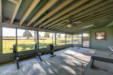 Move in ready! Super Cozy Frank Lloyd Wright type, red brick on Antelope Hills Golf Courses in Arizona - for sale on GolfHomes.com, golf home, golf lot