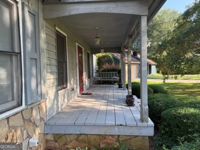 Wonderfully maintained and perfectly located, this 4 bedroom, 2 on Honey Creek Country Club in Georgia - for sale on GolfHomes.com, golf home, golf lot