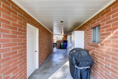 Move in ready! Super Cozy Frank Lloyd Wright type, red brick on Antelope Hills Golf Courses in Arizona - for sale on GolfHomes.com, golf home, golf lot