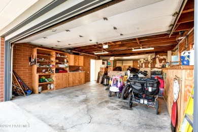 Move in ready! Super Cozy Frank Lloyd Wright type, red brick on Antelope Hills Golf Courses in Arizona - for sale on GolfHomes.com, golf home, golf lot