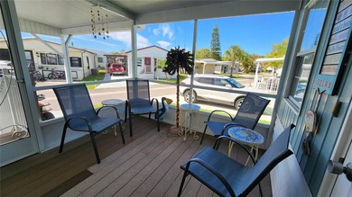 SO MUCH TO OFFER IN THIS ONE BEDROOM, 1 1/2 BATH MOBILE HOME IN on River Run Golf Links in Florida - for sale on GolfHomes.com, golf home, golf lot
