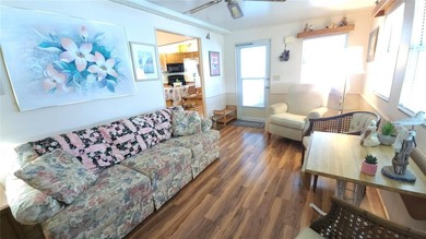 SO MUCH TO OFFER IN THIS ONE BEDROOM, 1 1/2 BATH MOBILE HOME IN on River Run Golf Links in Florida - for sale on GolfHomes.com, golf home, golf lot