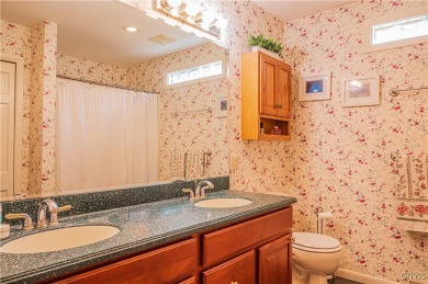 This beautiful 3-bedroom, 2-bath ranch is tucked away in the on Teugega Country Club in New York - for sale on GolfHomes.com, golf home, golf lot