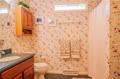 This beautiful 3-bedroom, 2-bath ranch is tucked away in the on Teugega Country Club in New York - for sale on GolfHomes.com, golf home, golf lot