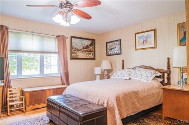 This beautiful 3-bedroom, 2-bath ranch is tucked away in the on Teugega Country Club in New York - for sale on GolfHomes.com, golf home, golf lot