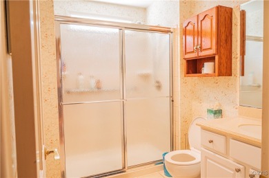 This beautiful 3-bedroom, 2-bath ranch is tucked away in the on Teugega Country Club in New York - for sale on GolfHomes.com, golf home, golf lot