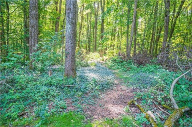This beautiful 3-bedroom, 2-bath ranch is tucked away in the on Teugega Country Club in New York - for sale on GolfHomes.com, golf home, golf lot