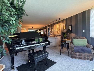 BEAUTIFUL GOLF COURSE VIEWS provide a serene environment for on Palm-Aire Country Club and Resort - Palms in Florida - for sale on GolfHomes.com, golf home, golf lot