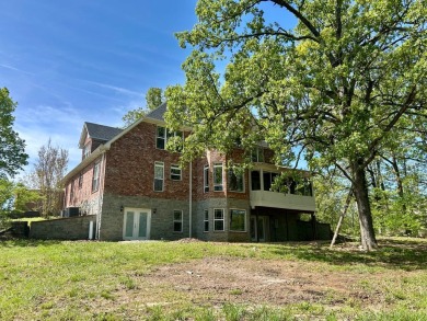 If plenty of space is what you are looking for, this impressive on Rolling Hills Country Club in Arkansas - for sale on GolfHomes.com, golf home, golf lot