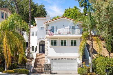 This modern hillside residence in Woodland Hills offers 4 on Woodland Hills Country Club in California - for sale on GolfHomes.com, golf home, golf lot