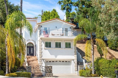 This modern hillside residence in Woodland Hills offers 4 on Woodland Hills Country Club in California - for sale on GolfHomes.com, golf home, golf lot