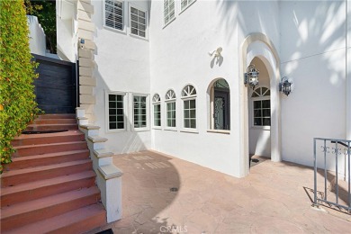 This modern hillside residence in Woodland Hills offers 4 on Woodland Hills Country Club in California - for sale on GolfHomes.com, golf home, golf lot