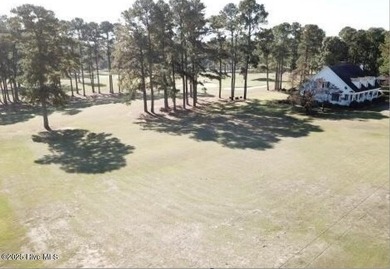 Nestled within the prestigious Duplin Country Club, Lot 49 on Majestic Pines Golf and Country Club in North Carolina - for sale on GolfHomes.com, golf home, golf lot