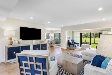 Experience the convenience of this renovated first-floor corner on Quail Ridge Golf Course and Country Club in Florida - for sale on GolfHomes.com, golf home, golf lot