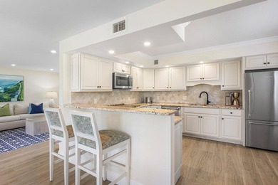 Experience the convenience of this renovated first-floor corner on Quail Ridge Golf Course and Country Club in Florida - for sale on GolfHomes.com, golf home, golf lot